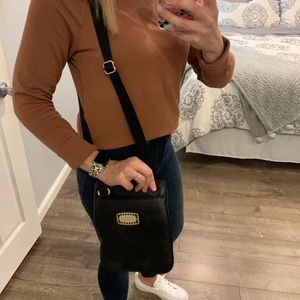 Michael Kors black crossbody bag.